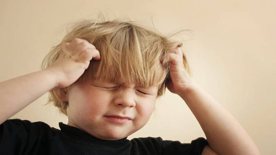 A four year old boy scratching his head Please see some similar images from my portfolio :